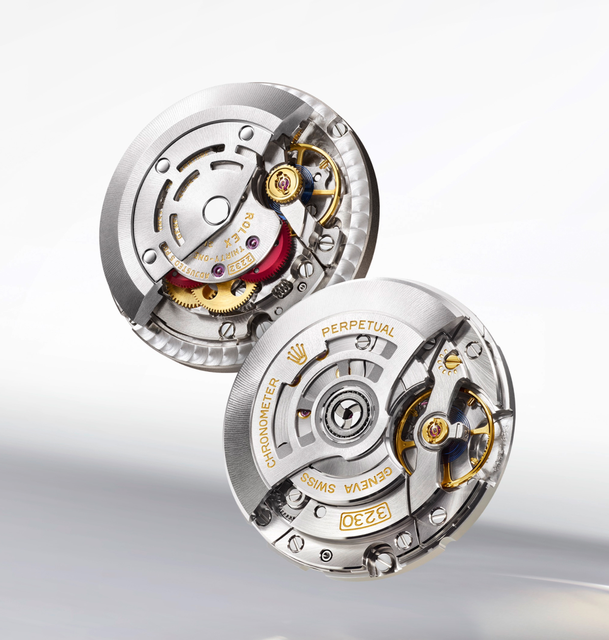 Close-up of an elegant silver wristwatch with a diamond-encrusted bezel and a black strap, displayed on a light gradient background.